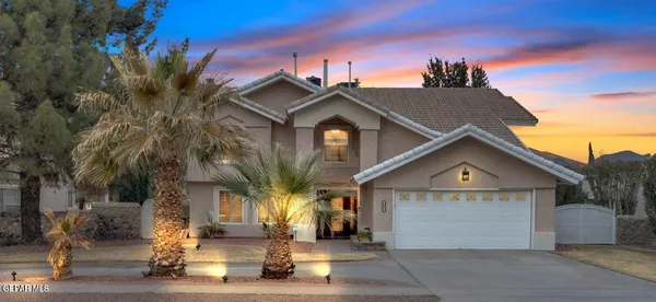 a view of a house with a street