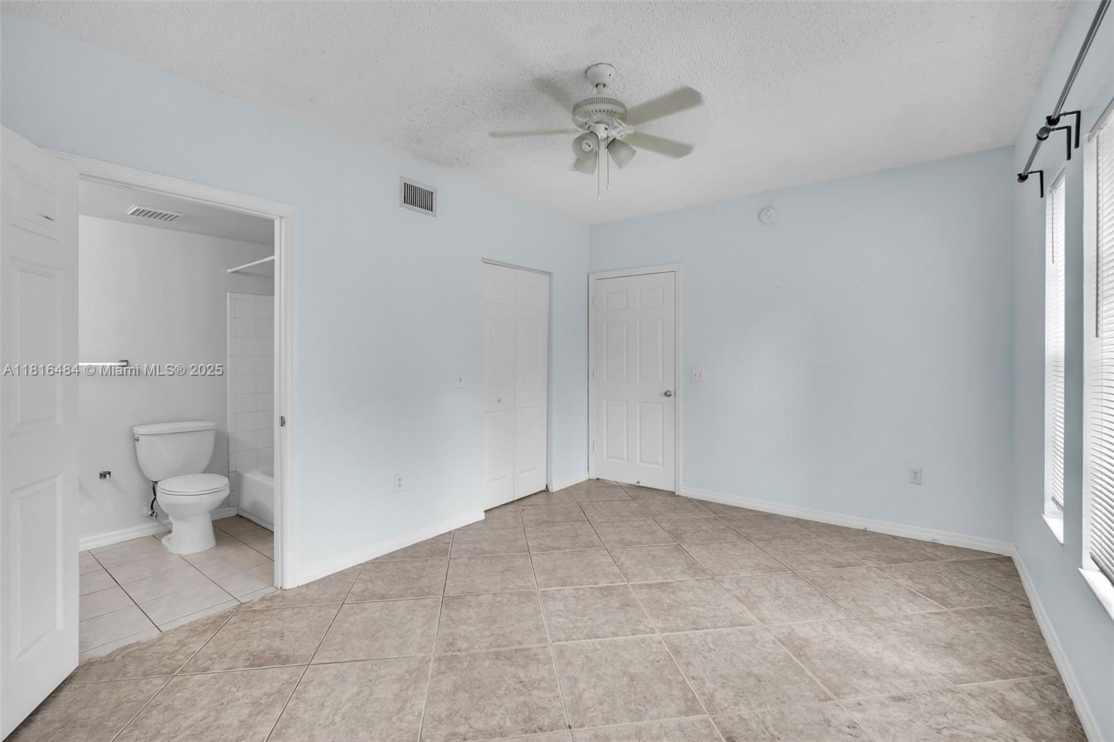 2474 Centergate Drive, Unit 101 Miramar, FL 33025 - Photo 18 of 28 a view of an empty room and a bathroom