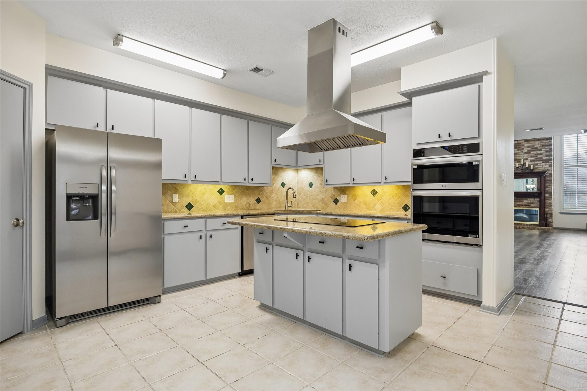 727 Bunker Hill Road, Unit 92 Houston, TX 77024 - Photo 10 of 50 THE CHEF'S KITCHEN HOSTS NEW REFRIGERATOR, NEW OVEN & NEW MICROWAVE. (INSTALLED IN 2026 & UNUSED!)