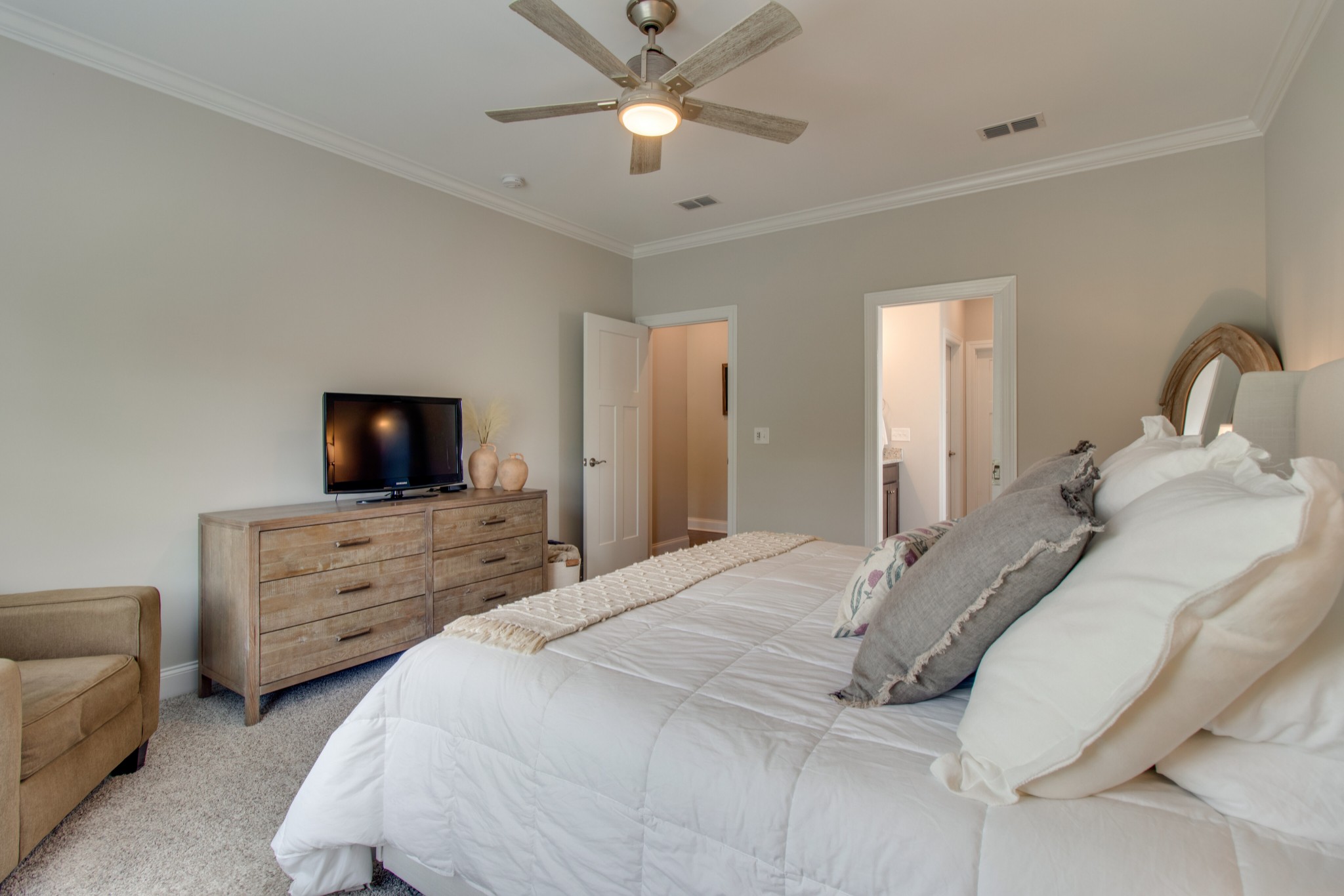 336 Beulah Rose Drive Murfreesboro, TN 37128 - Photo 15 of 42 a bedroom with a bed and a flat screen tv