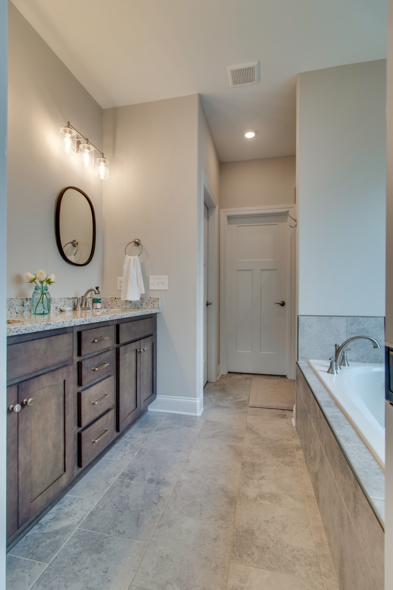 336 Beulah Rose Drive Murfreesboro, TN 37128 - Photo 16 of 42 a bathroom with a granite countertop sink mirror and vanity