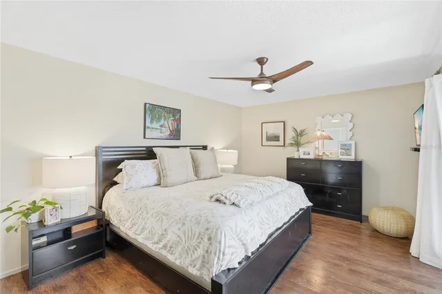 a bathroom with a mirror sink and toilet