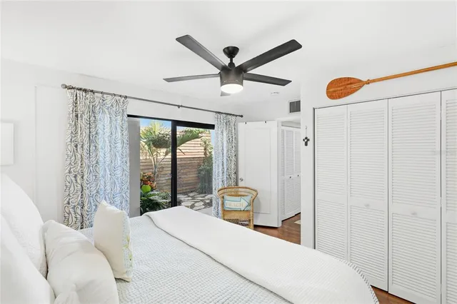 a view of a house with a yard and plants