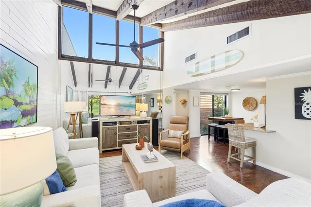 a living room with furniture and a table