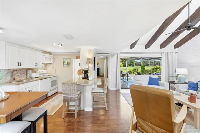 a bedroom with a large bed and a large window