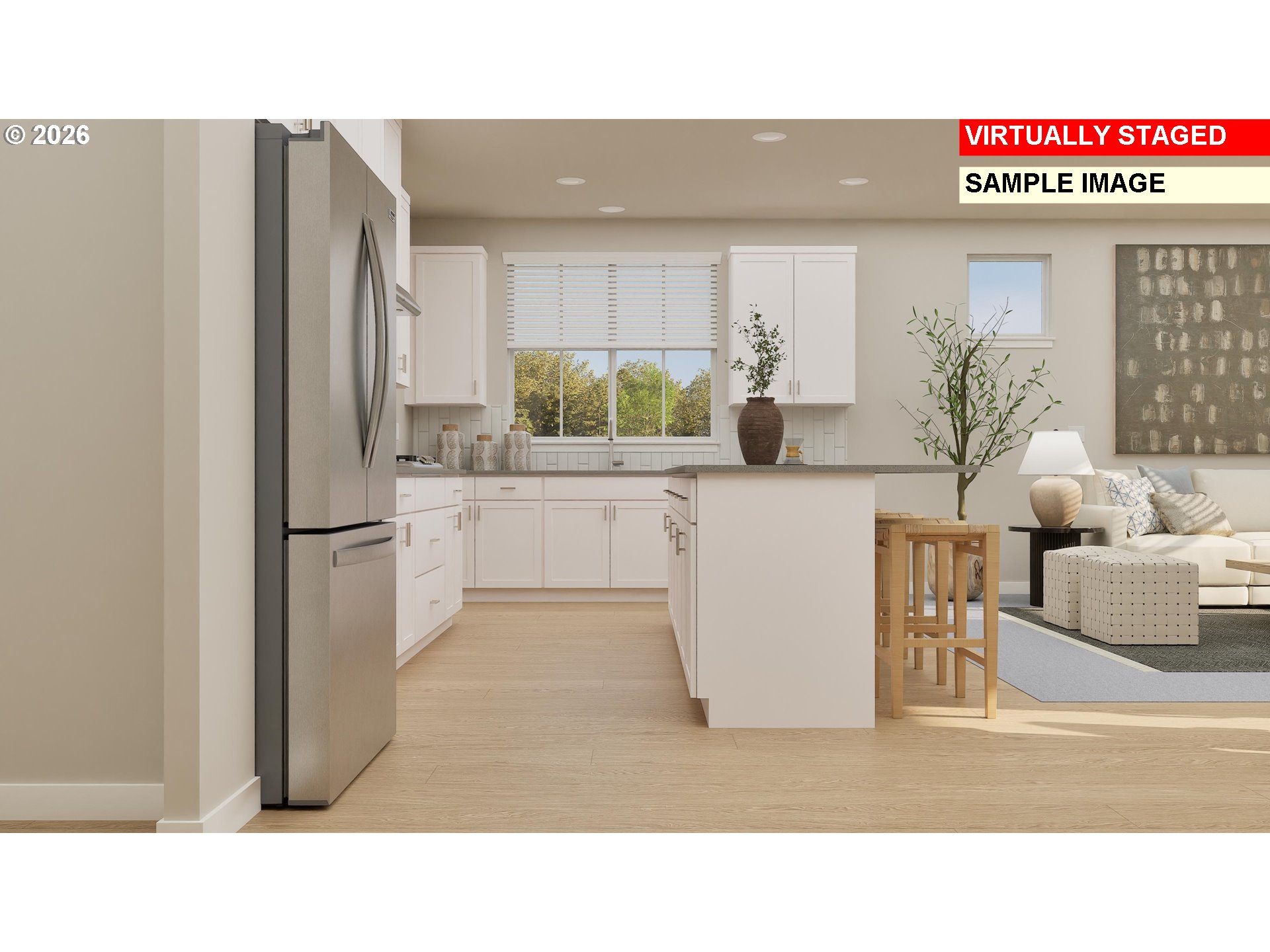 16908 Southwest Lorikeet Lane Beaverton, OR 97007 - Photo 3 of 20 a kitchen with a refrigerator and a cabinets
