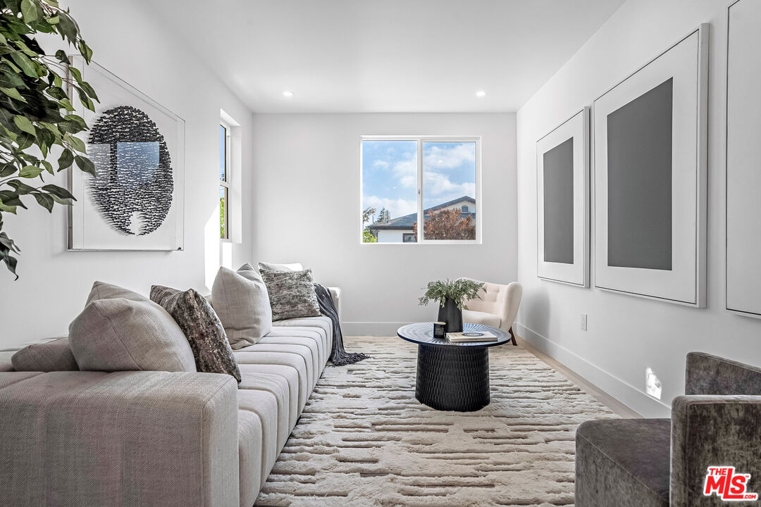 5830 David Avenue Los Angeles, CA 90034 - Photo 18 of 46 a living room with furniture