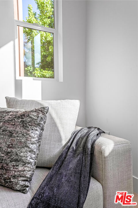 5830 David Avenue Los Angeles, CA 90034 - Photo 20 of 46 a bed sitting next to a window