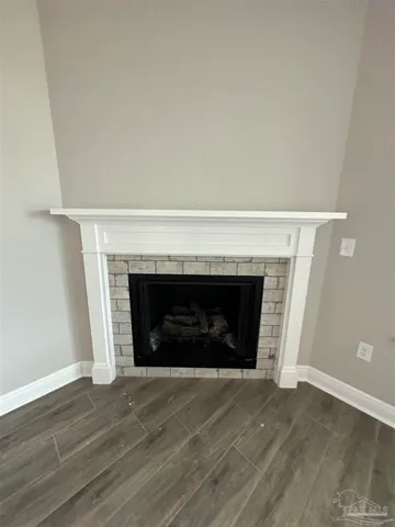 an empty room with a fireplace