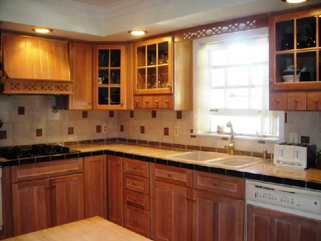 2217 Bowman Road Franklin, TN 37064 - Photo 2 of 6 Newer kitchen warm oak cabinets, gas cooktop, double ovens.