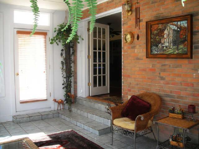 2217 Bowman Road Franklin, TN 37064 - Photo 4 of 6 Sunroom leads to deck and private parklike backyard.