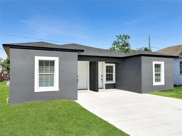 a front view of a house with a porch