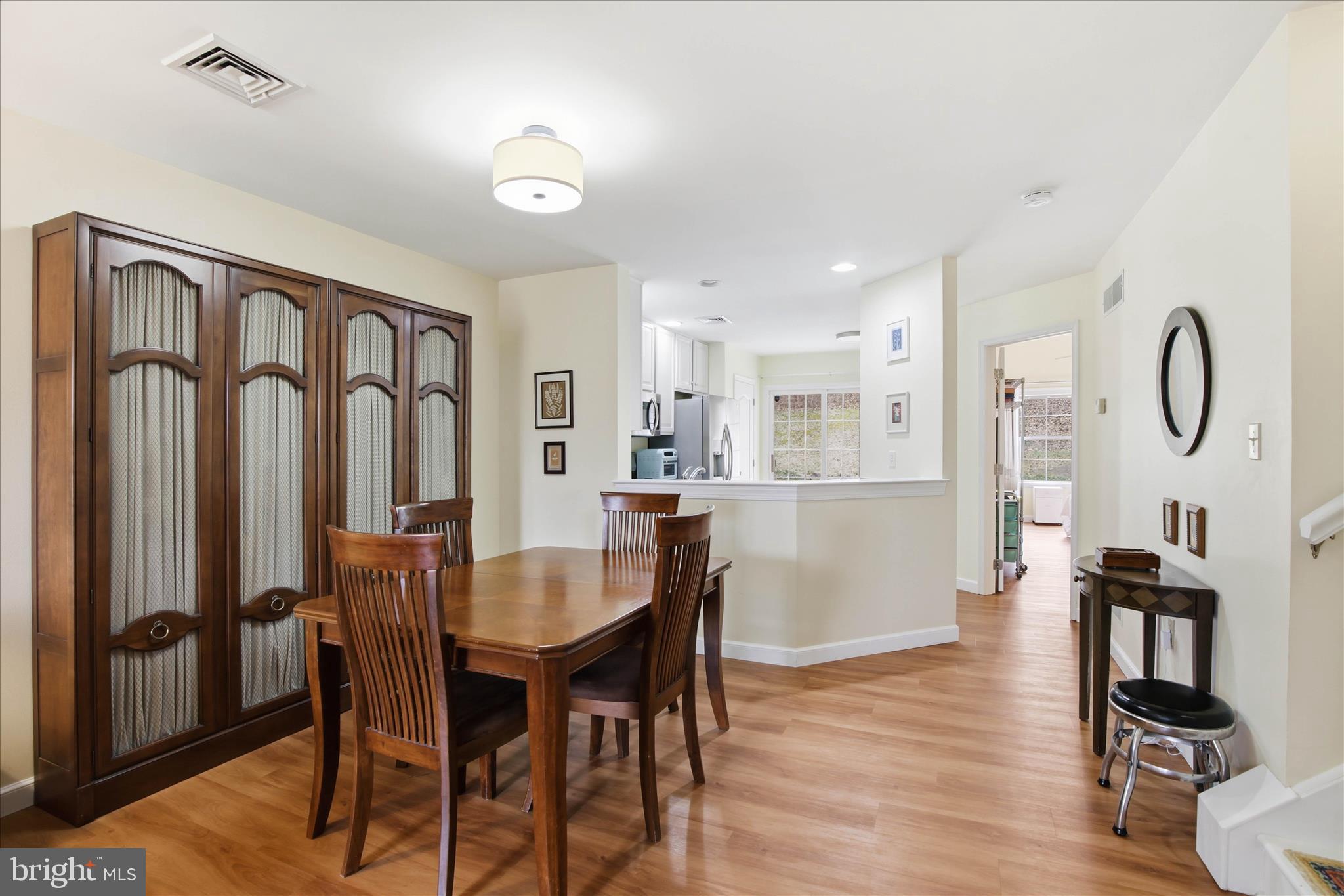 52 Coopers Way Denver, PA 17517 - Photo 8 of 29 a view of a a dining room with furniture window and wooden floor