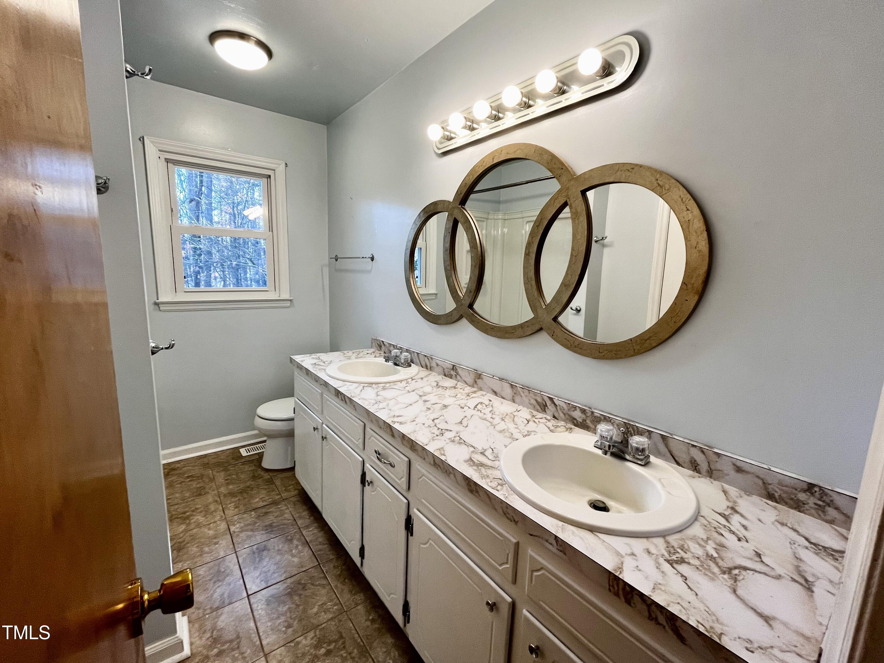 3111 Tanager Street Raleigh, NC 27606 - Photo 29 of 56 29-GuestBath1