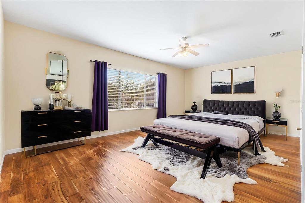 13655 Southeast 97th Terrace Road Summerfield, FL 34491 - Photo 26 of 49 a bedroom with a bed and a window