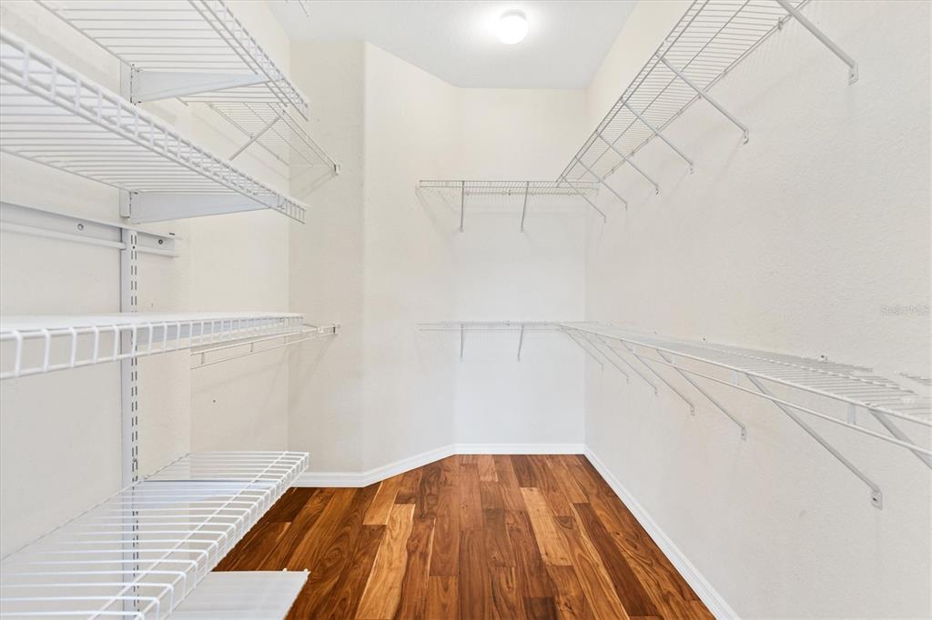 13655 Southeast 97th Terrace Road Summerfield, FL 34491 - Photo 28 of 49 a view of a room with wooden floor