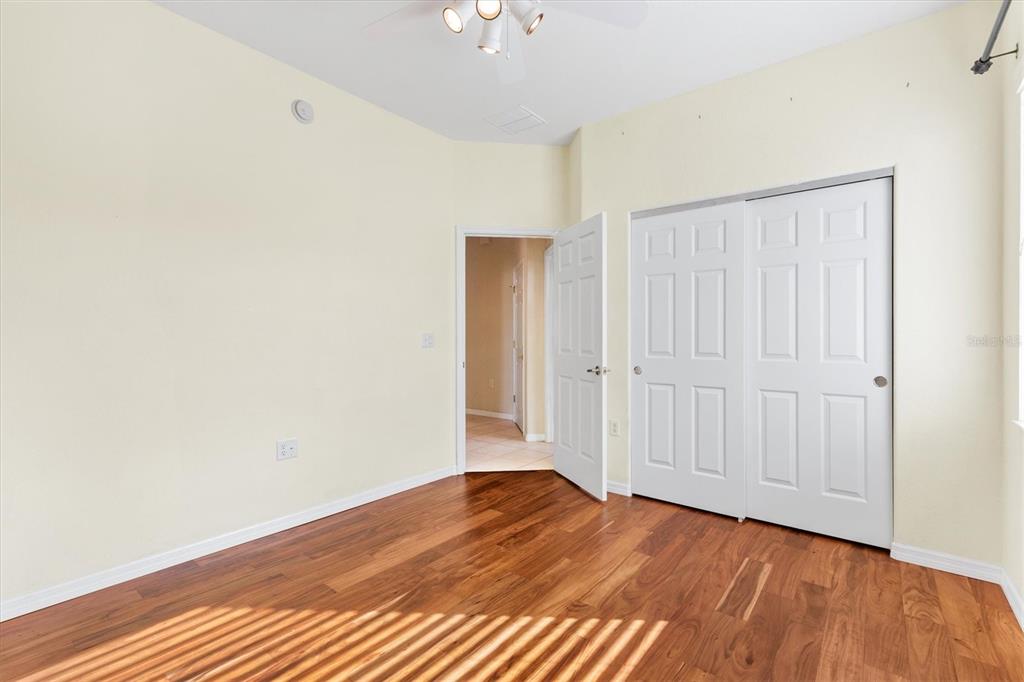 13655 Southeast 97th Terrace Road Summerfield, FL 34491 - Photo 32 of 49 wooden floor in an empty room