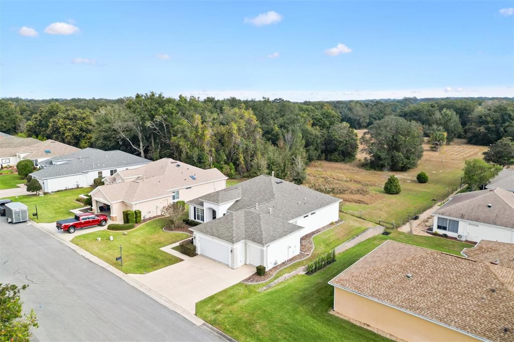 13655 Southeast 97th Terrace Road Summerfield, FL 34491 - Photo 44 of 49 an aerial view of a house with porch