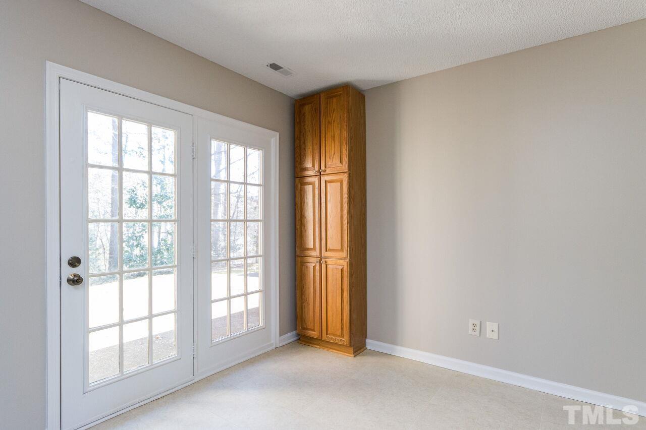 718 Red Forest Trail Raleigh, NC 27615 - Photo 13 of 30 Breakfast Area with door opening to the private backyard and patio.