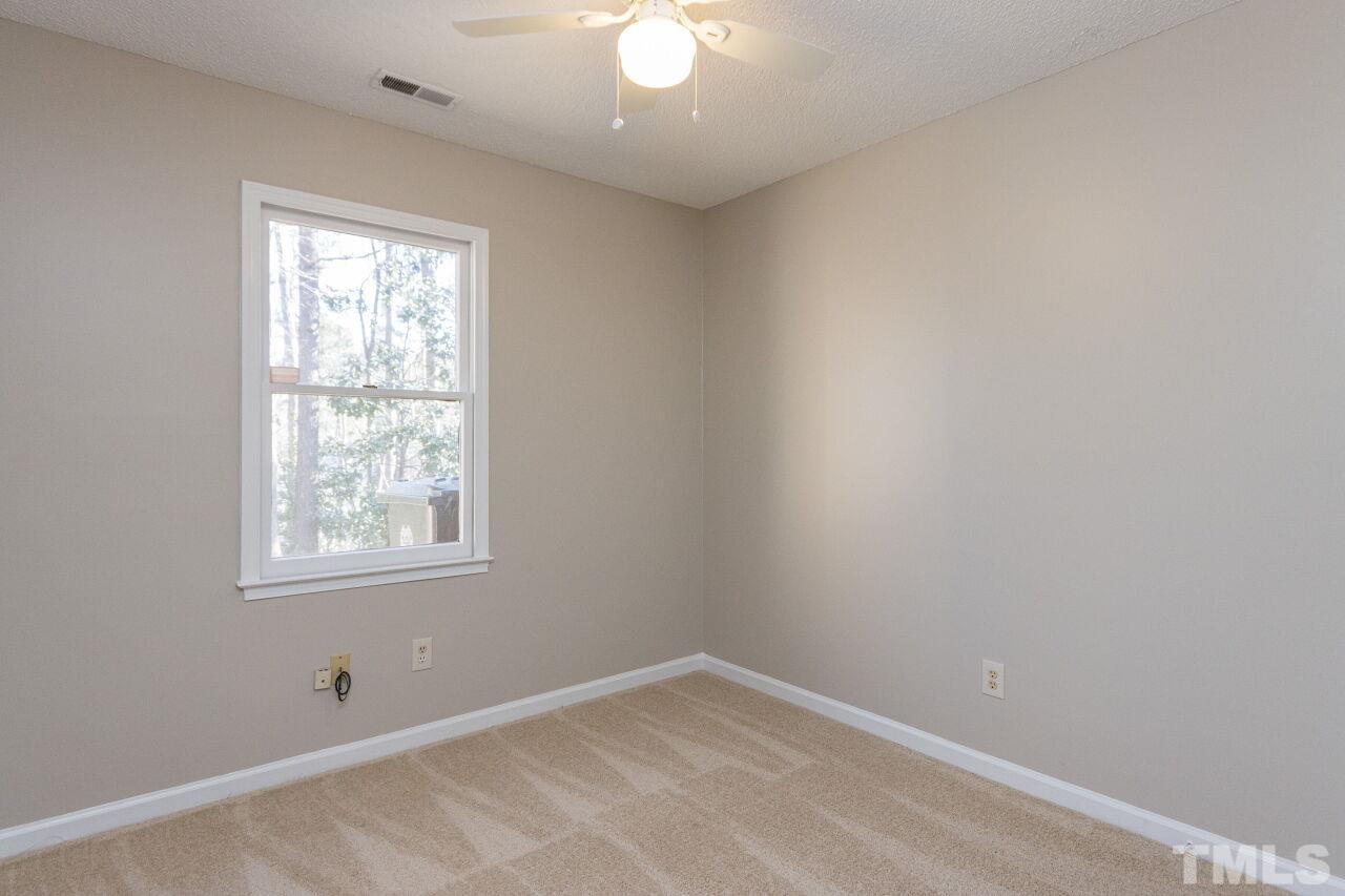 718 Red Forest Trail Raleigh, NC 27615 - Photo 20 of 30 Secondary bedroom or office / craft space. New carpet and paint.