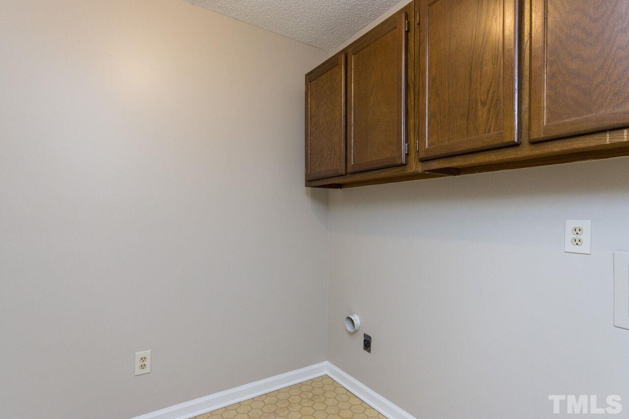 718 Red Forest Trail Raleigh, NC 27615 - Photo 25 of 30 Very large laundry room near the bedrooms. Plenty of room to put a folding table and shelves in.