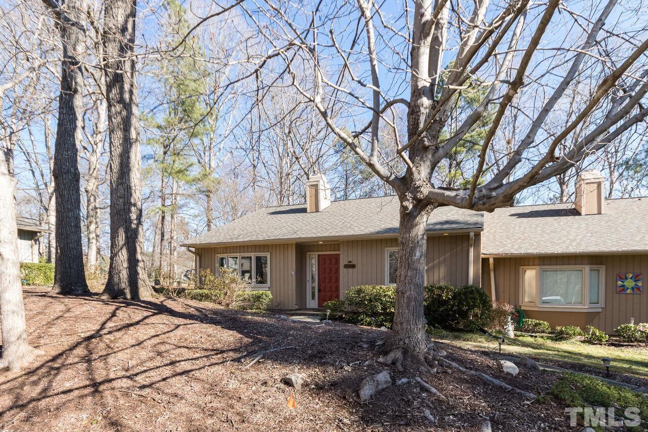 718 Red Forest Trail Raleigh, NC 27615 - Photo 30 of 30 Large front yard with big beautiful trees that will be full of spring blossoms soon.