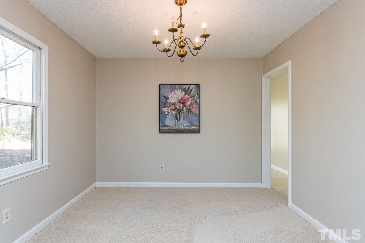718 Red Forest Trail Raleigh, NC 27615 - Photo 8 of 30 Entertain family or friends for dinner in this large dining area. Plenty of space for a long rectangle table and chairs.