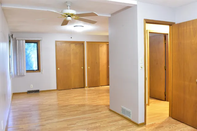a view of kitchen with furniture and window