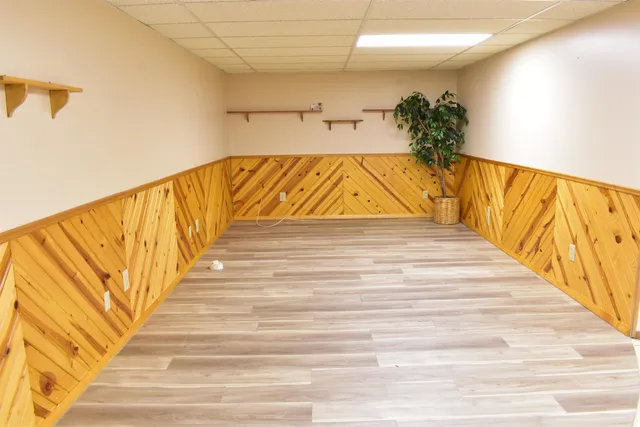 a front view of a house with a yard table and chairs