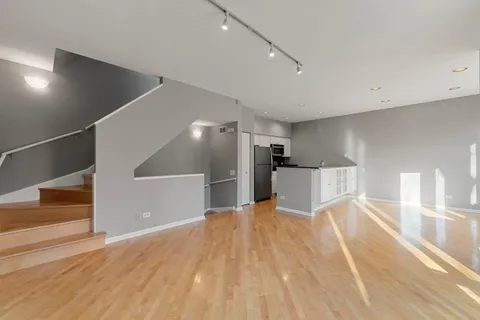 a view of a kitchen with a sink
