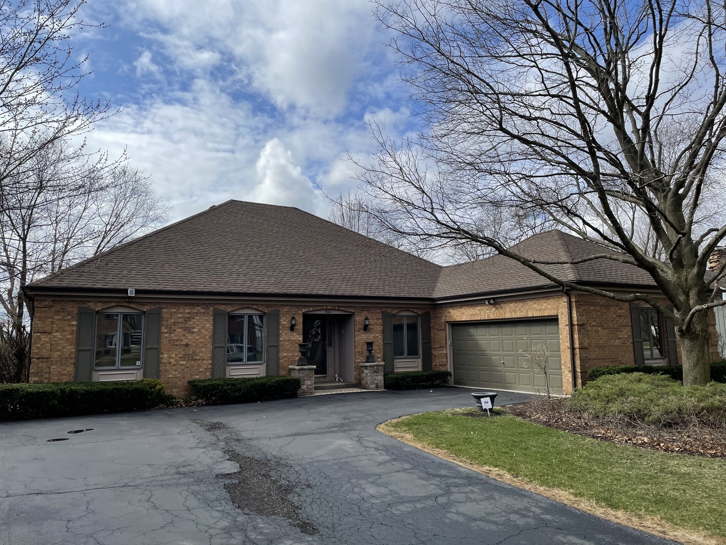 844 West Bauer Road Naperville, IL 60563 - Photo 1 of 1 a front view of a house with a yard and garage