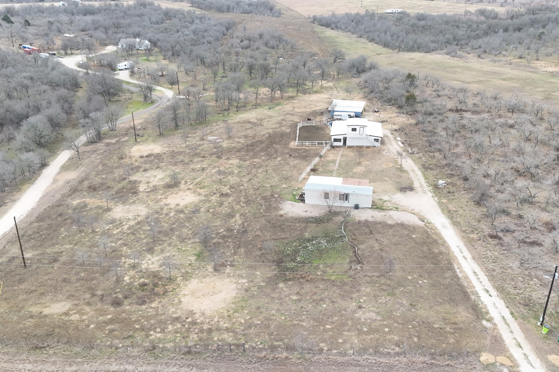 2690 County Road 466 Elgin, TX 78621 - Photo 11 of 19 a view of aerial view of residential houses with outdoor space