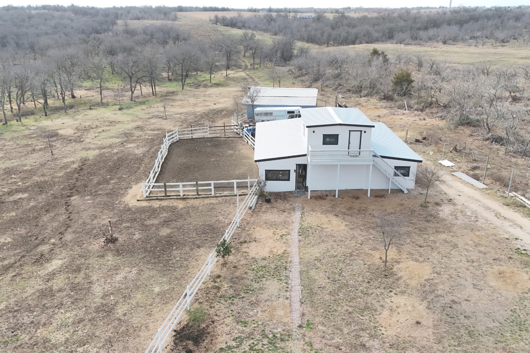 2690 County Road 466 Elgin, TX 78621 - Photo 6 of 19 a view of a houses with yard and trees