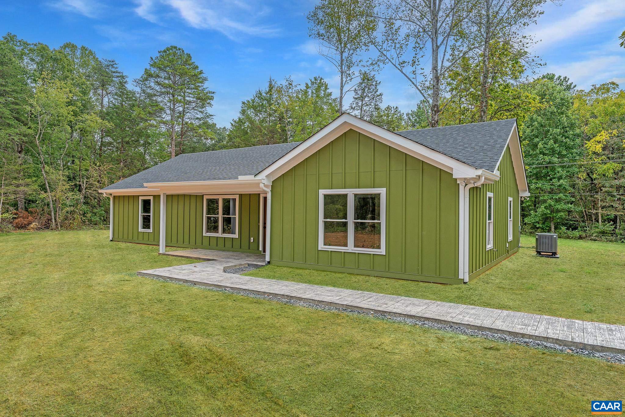 Lot 1 Ivy Road Howardsville, VA 24562 - Photo 2 of 34 a front view of a house with a garden