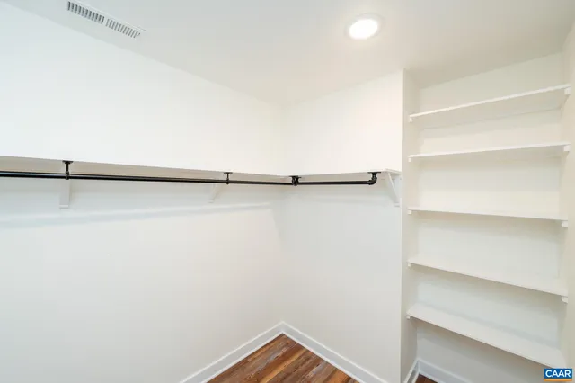 a view of small space with racks on the wall