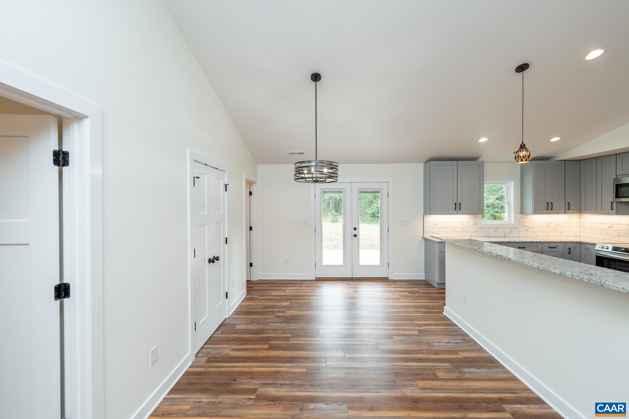 Lot 1 Ivy Road Howardsville, VA 24562 - Photo 10 of 34 a view of a kitchen with cabinets and wooden floor
