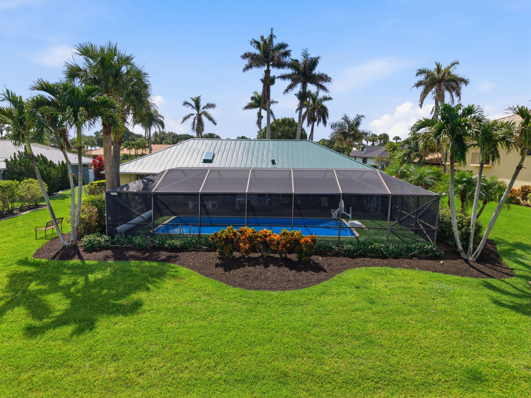 3374 Southeast Fairway East Stuart, FL 34997 - Photo 40 of 65 a view of a house with a big yard and potted plants