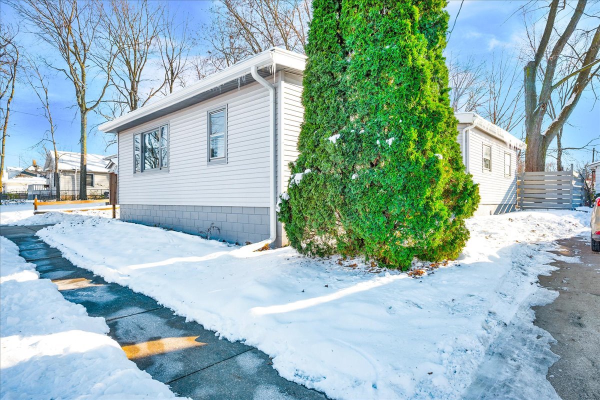 1406 West Walnut Street Bloomington, IL 61701 - Photo 26 of 32 a view of a house with a street