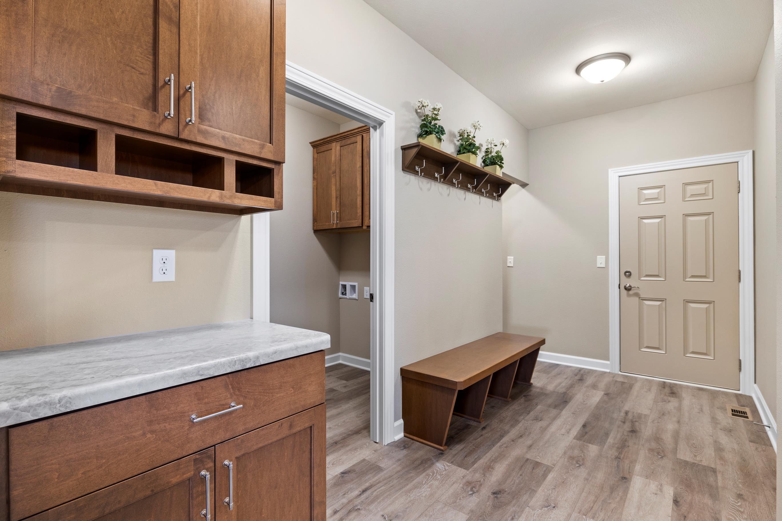 1596 Weston Rdg Road Oconomowoc, WI 53066 - Photo 14 of 16 Mudroom and Laundry