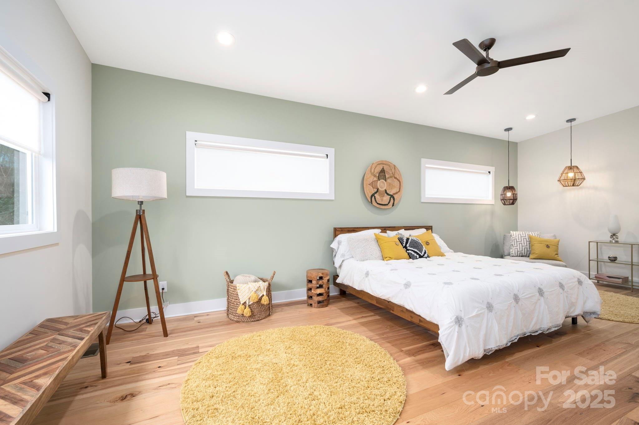 20 Garden Road Asheville, NC 28804 - Photo 16 of 44 a bedroom with a bed and a window