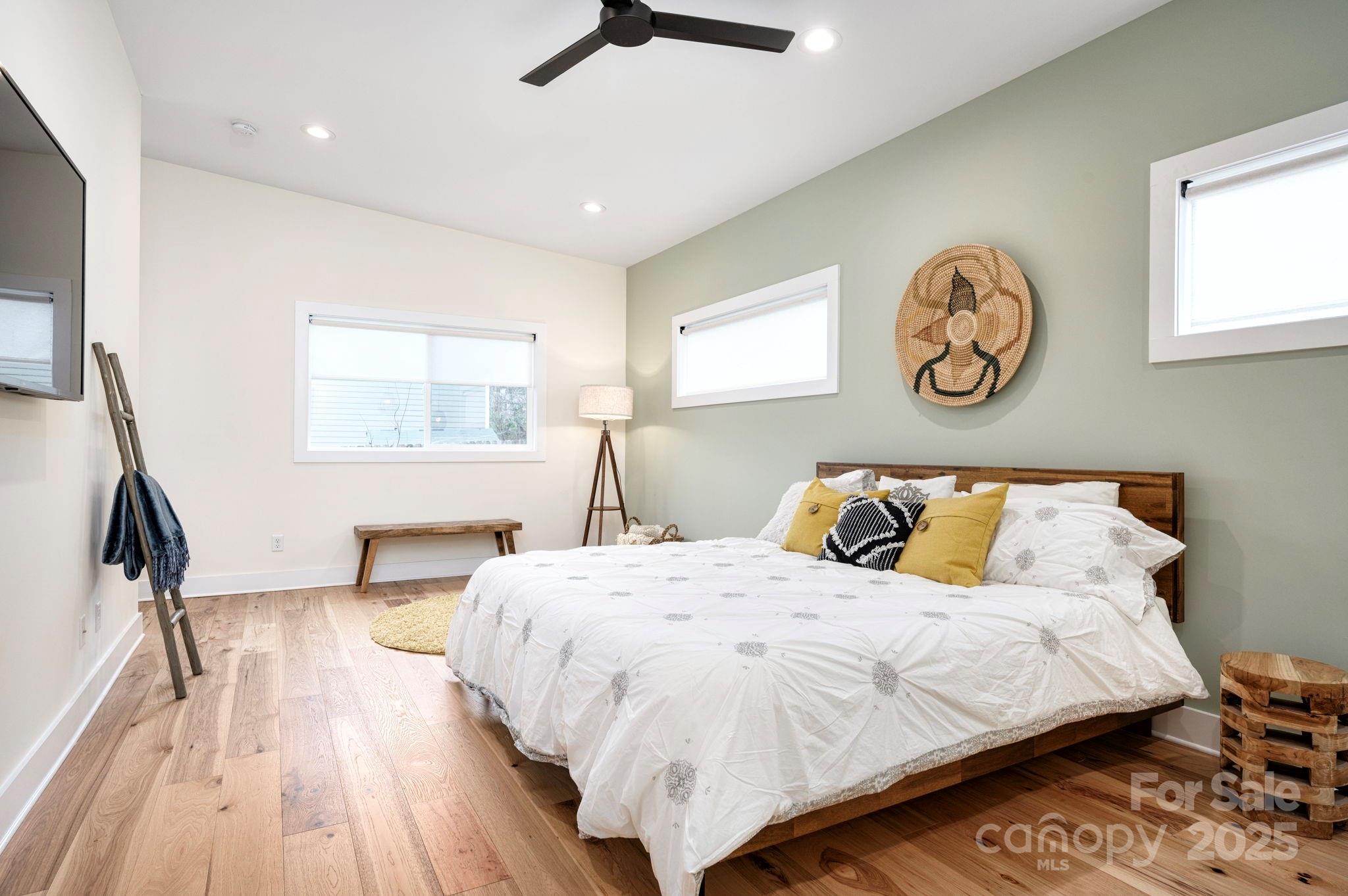 20 Garden Road Asheville, NC 28804 - Photo 18 of 44 a bedroom with bed and a window