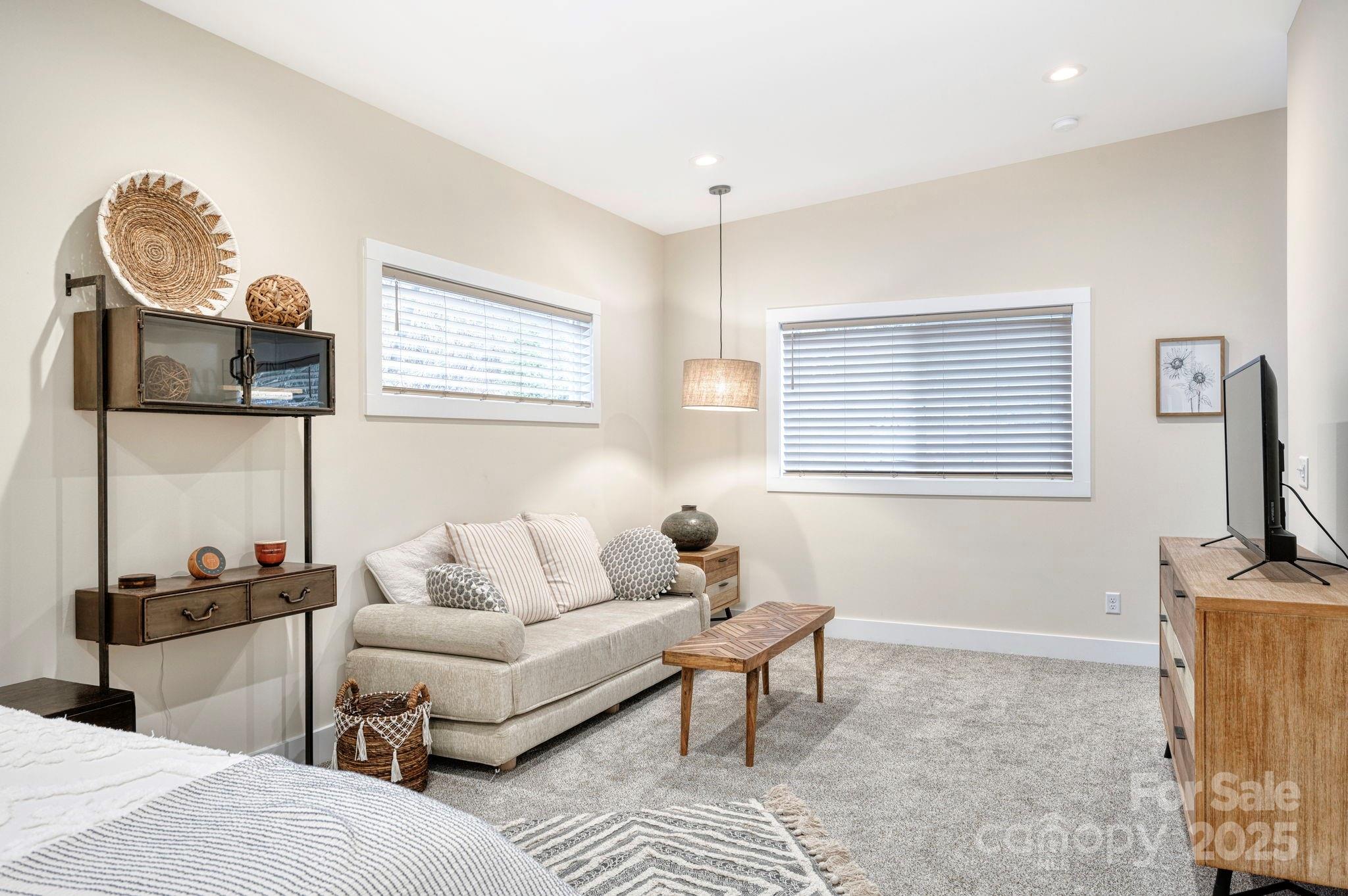 20 Garden Road Asheville, NC 28804 - Photo 38 of 44 a living room with furniture and a window