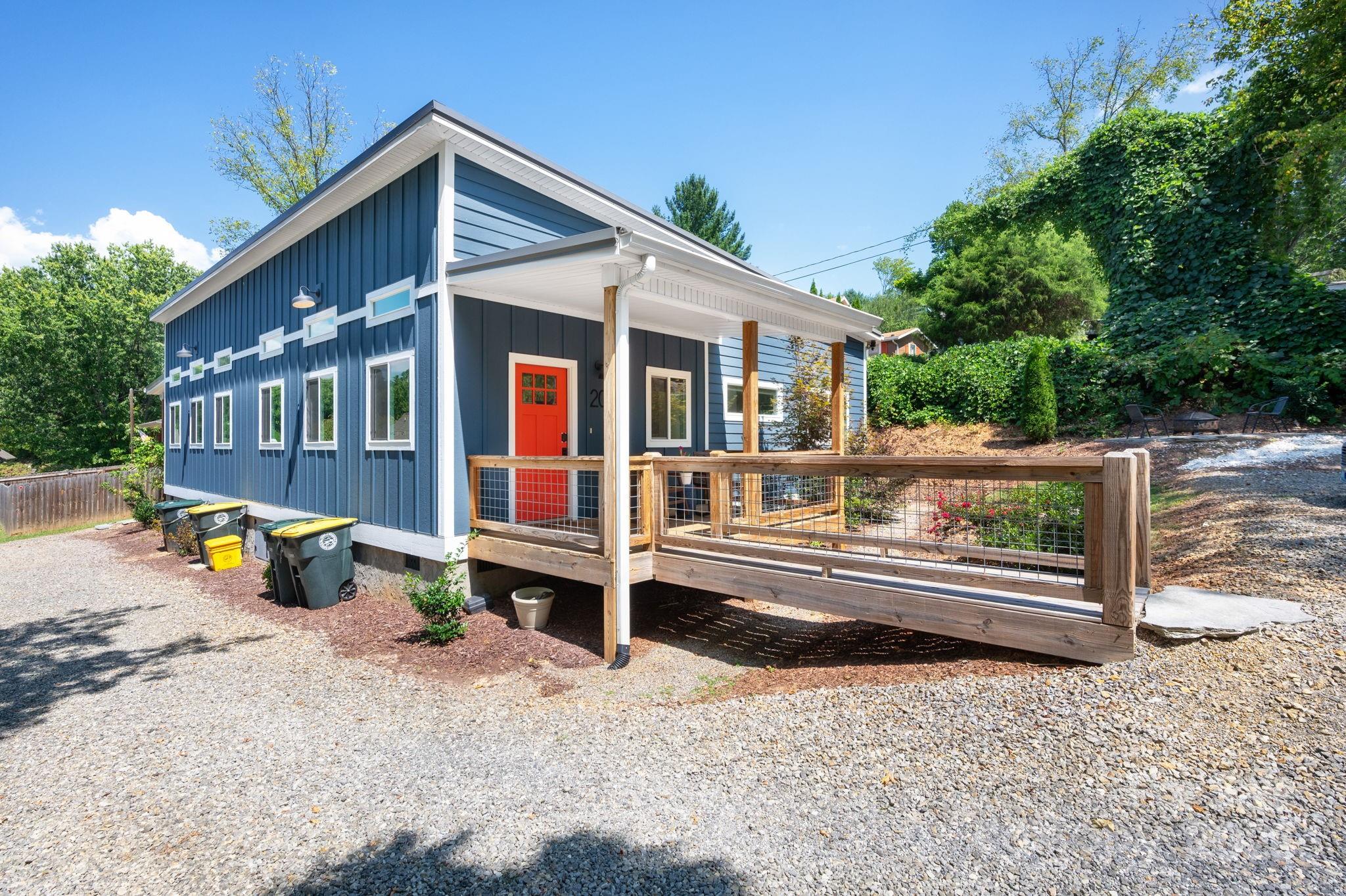 20 Garden Road Asheville, NC 28804 - Photo 43 of 44 a front view of a house with swimming pool and sitting area