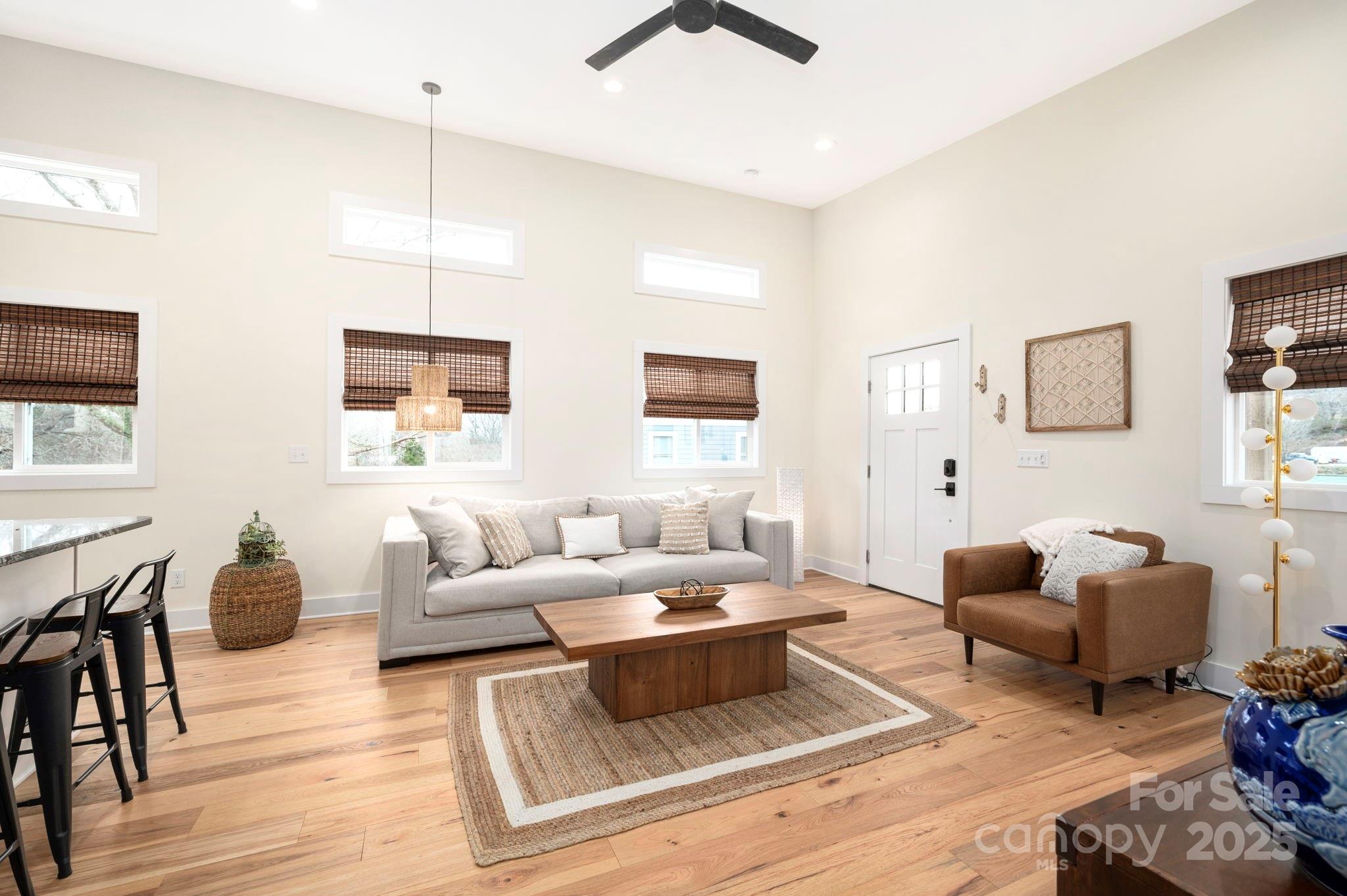 20 Garden Road Asheville, NC 28804 - Photo 9 of 44 a living room with furniture or couch and a wooden floor
