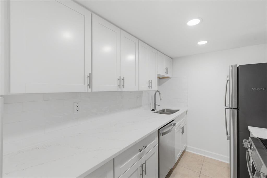 8901 Blind Pass Road, Unit 127 St. Pete Beach, FL 33706 - Photo 10 of 58