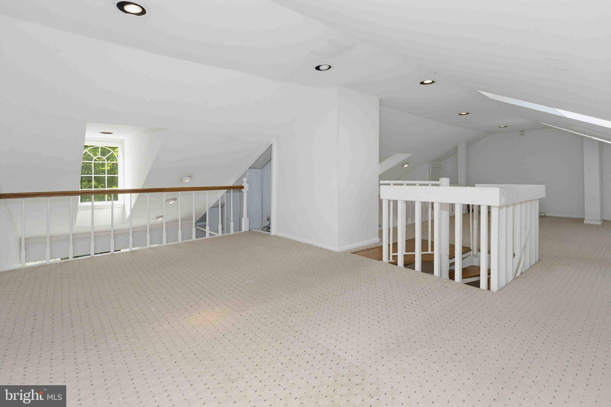 1268 Rydal Road Jenkintown, PA 19046 - Photo 28 of 31 a view of an empty room with windows