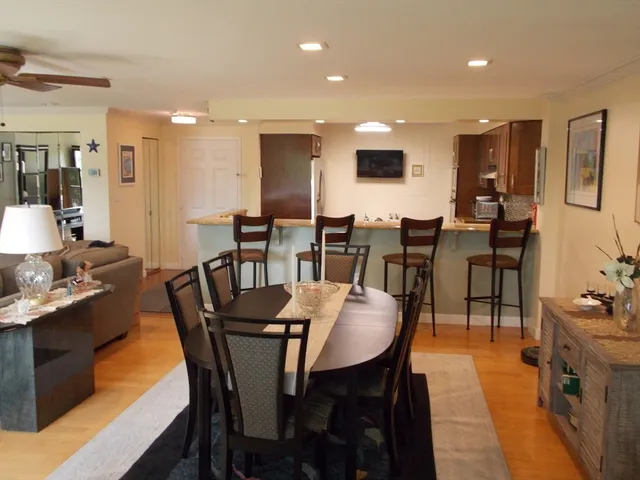 a balcony view with a seating space