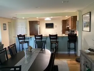 a view of a dining room with furniture