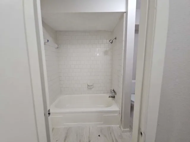a bathroom with a bathtub