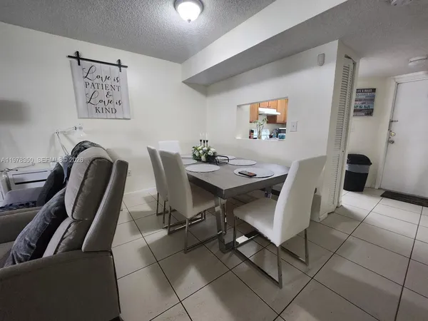 a view of a workspace with furniture